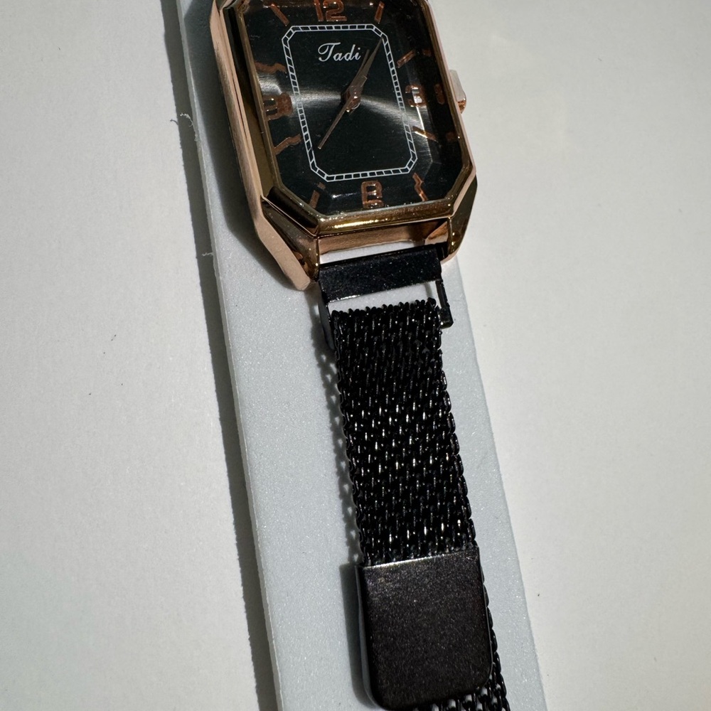 Black and Gold women’s Watch